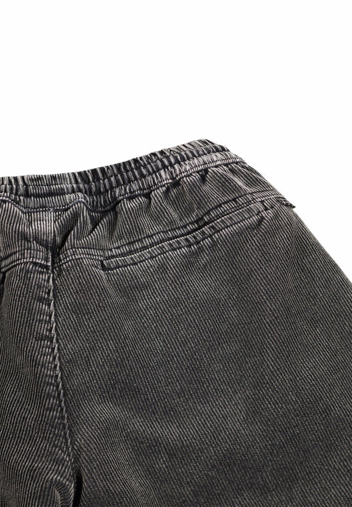 Close-up of pants with a white background