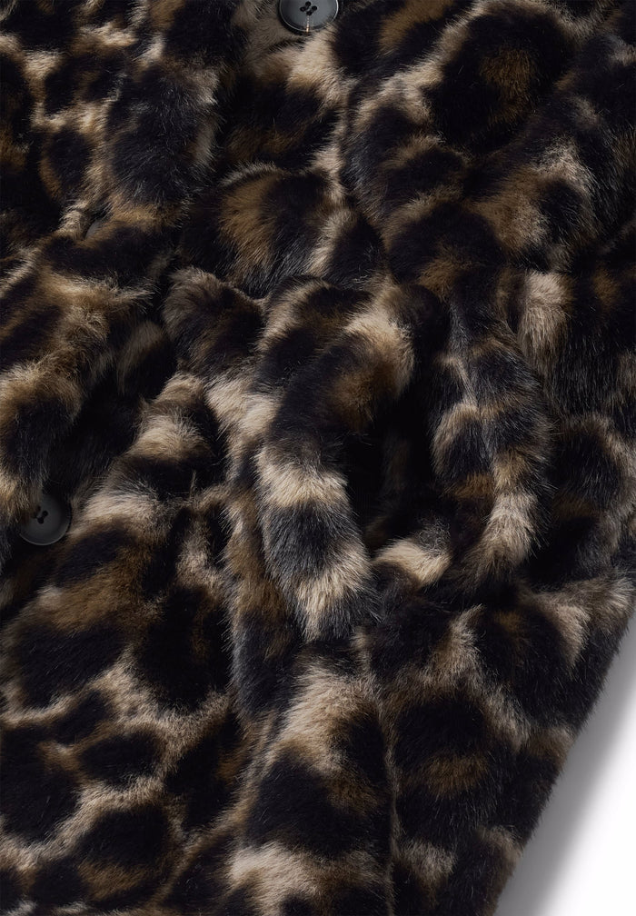 Close-up of leopard print fabric with a white background