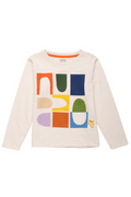 A cream-colored long-sleeve t-shirt with a colorful geometric block pattern on the front, featuring a small yellow logo on the lower right of the graphic. The shirt is displayed flat against a solid white background.