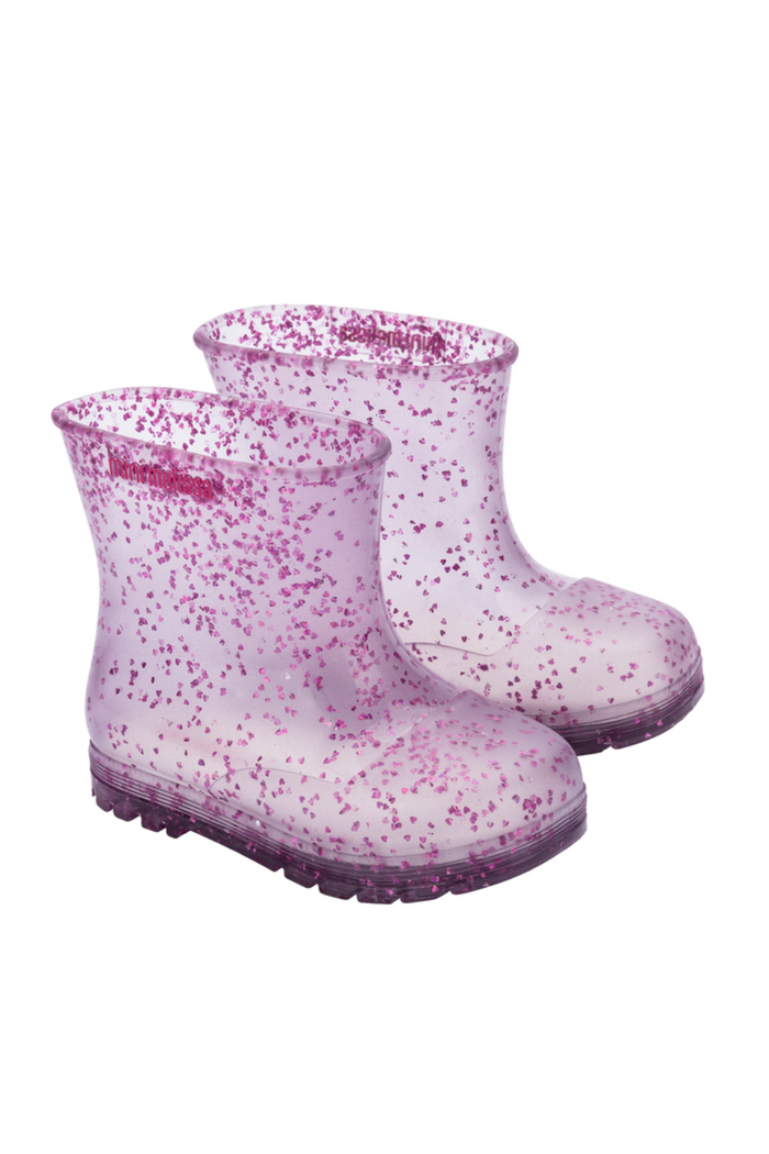 Pair of pink glittery rain boots on a white background