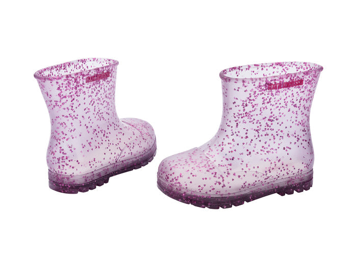 Pair of rain boots with glittery accents on a white background